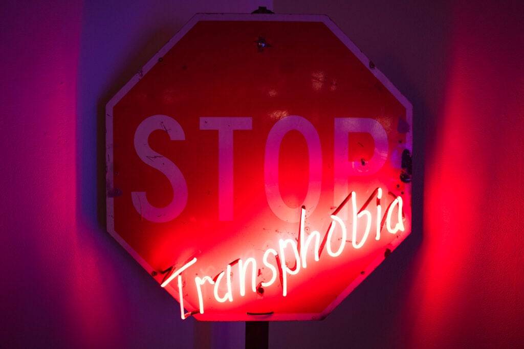 "Stop Transphobia" neon sign by Roxy Rose at Trans Pride LA 2025