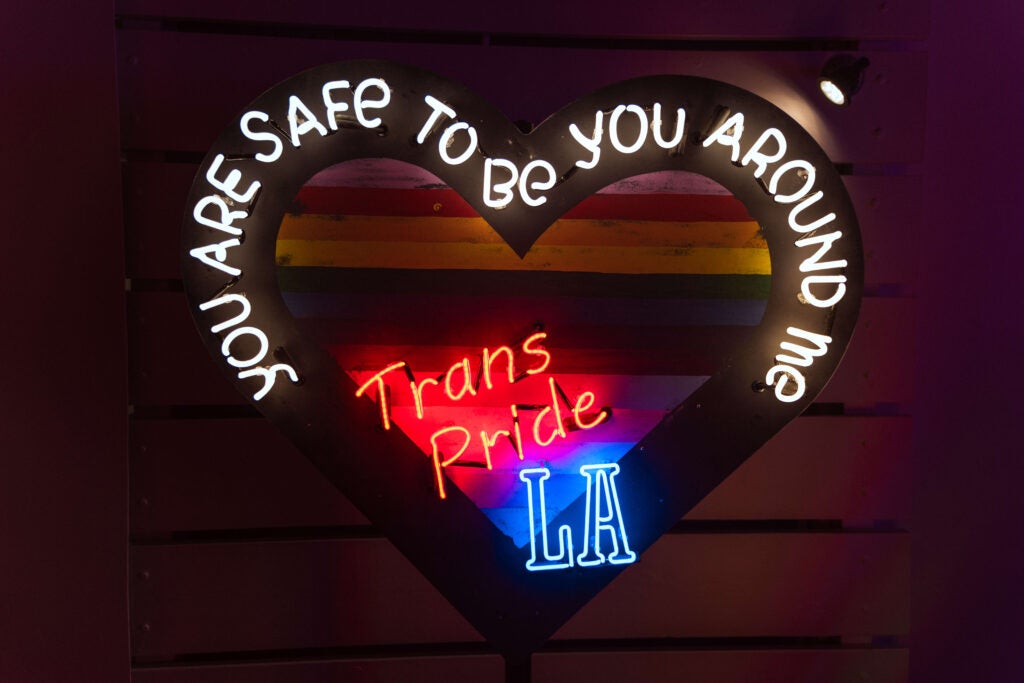 Neon sign by Roxy Rose at Trans Pride LA 2025